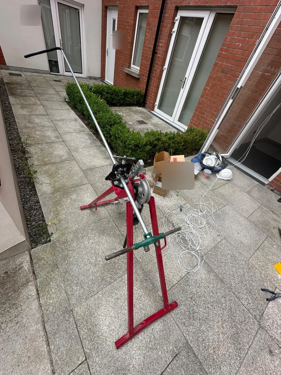 Cable installation equipment set up outside an apartment block