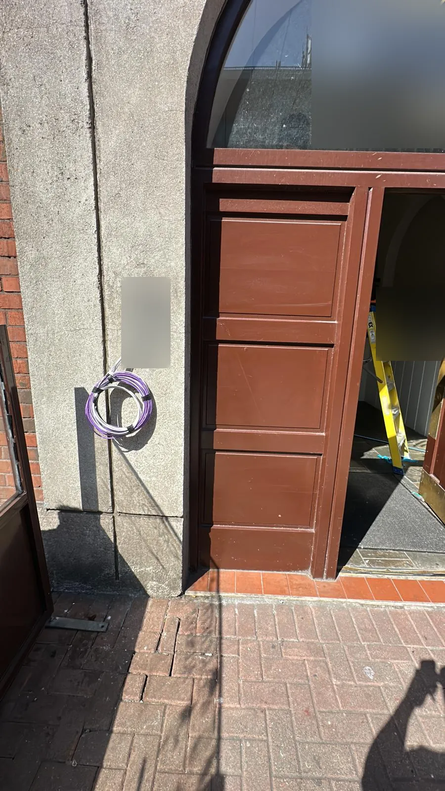 Cabling left ready at an entrance intercom panel