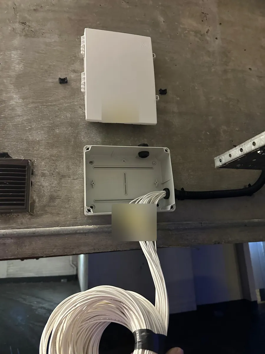 Enclosures and cable entry on a car park soffit
