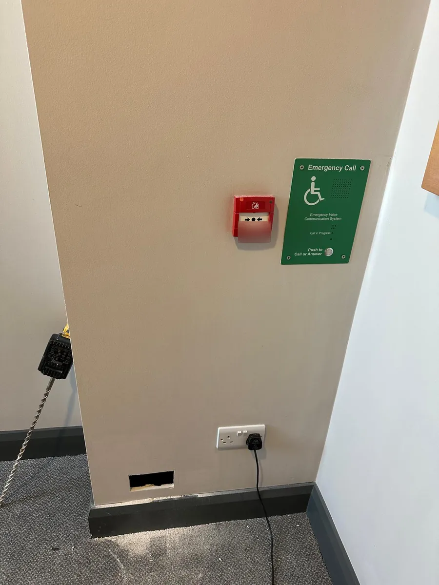 Cable run to an emergency call point in a common area