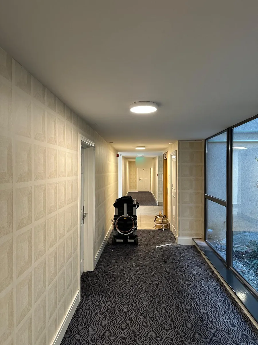 Installation kit set up in a long apartment corridor